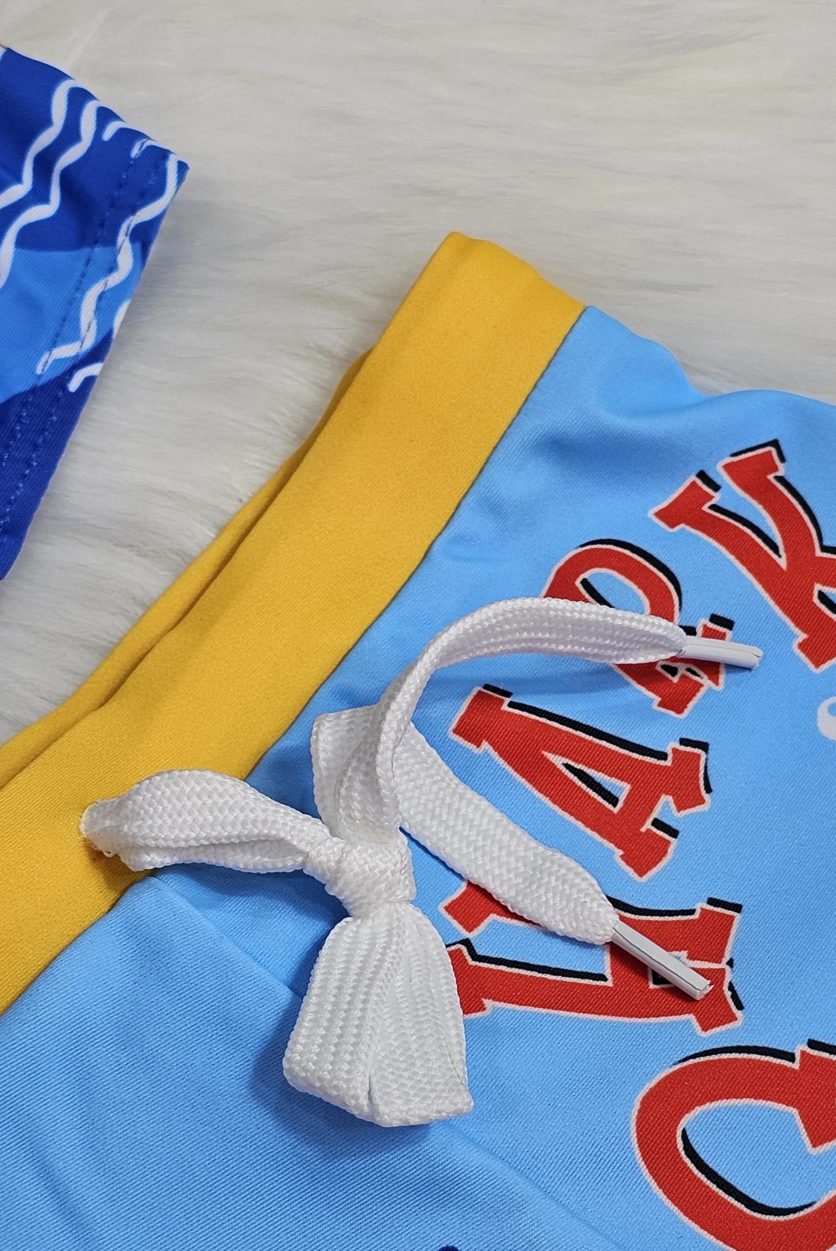 ملابس سباحة للاولاد من قطعتين ملابس سباحة للاولاد من قطعتين