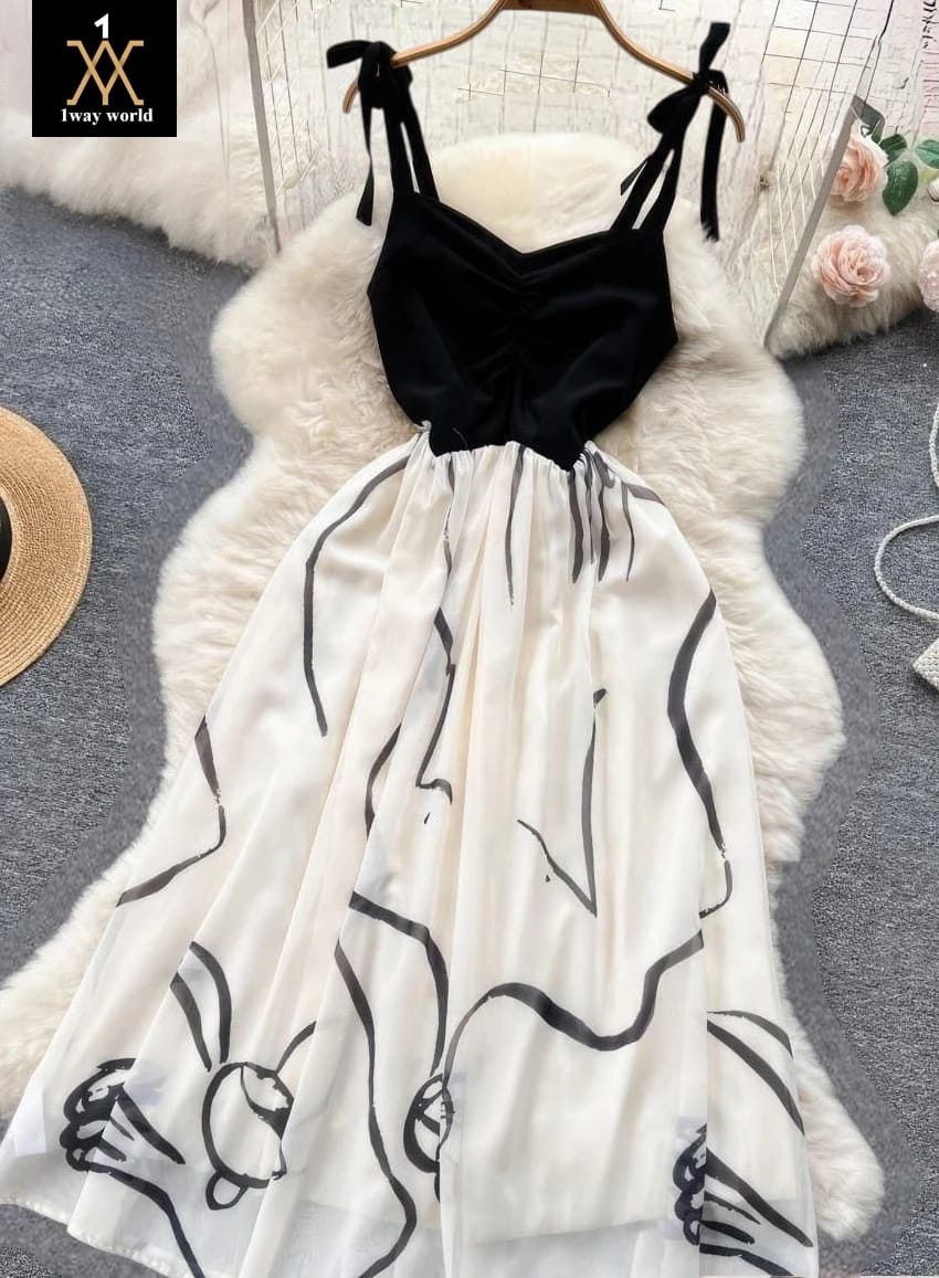 2025-09-13-68c5a1f7afbd5 فستان بربطة كتف وقماش مرن بنقوش تجريدية