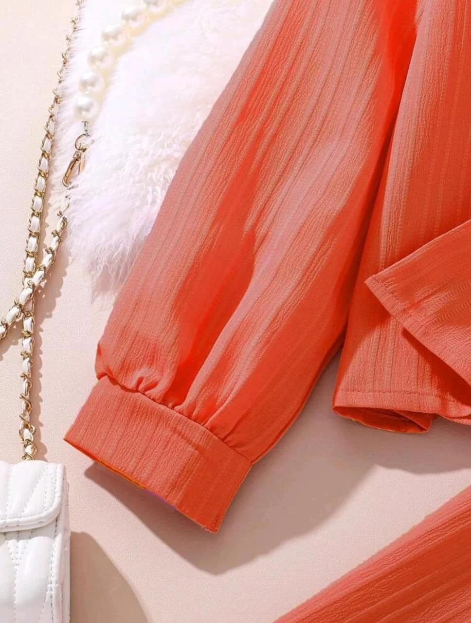 بدله للبنات باللون البرتقالي بدله للبنات باللون البرتقالي